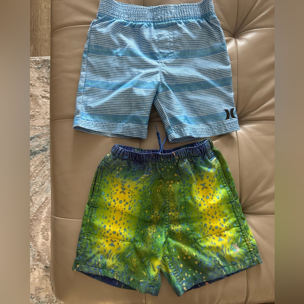 4T Swim Trunks 2 pairs. Hurley and Reel Legends Shorts.